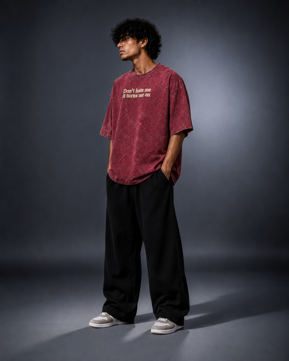 UpClothing Don't Hate Me 240 Cherry Cola acid wash oversized T-shirt — three-quarter editorial fit on Storm Blue-Grey backdrop