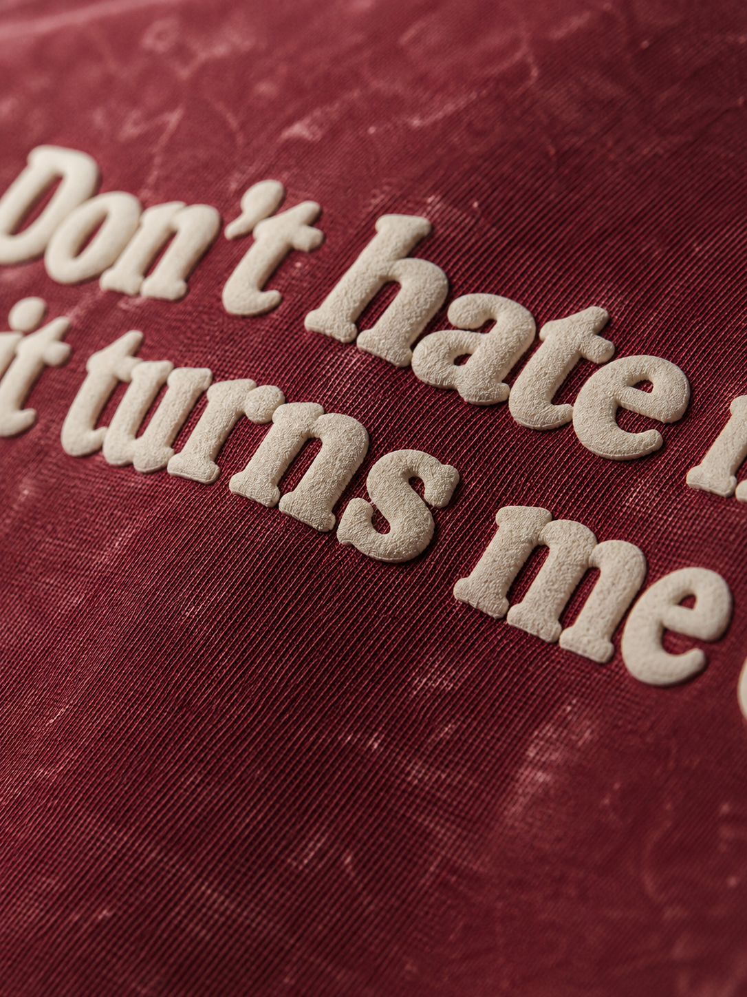 UpClothing Don't Hate Me Cherry Cola acid wash oversized T-shirt — cream raised puff print close-up