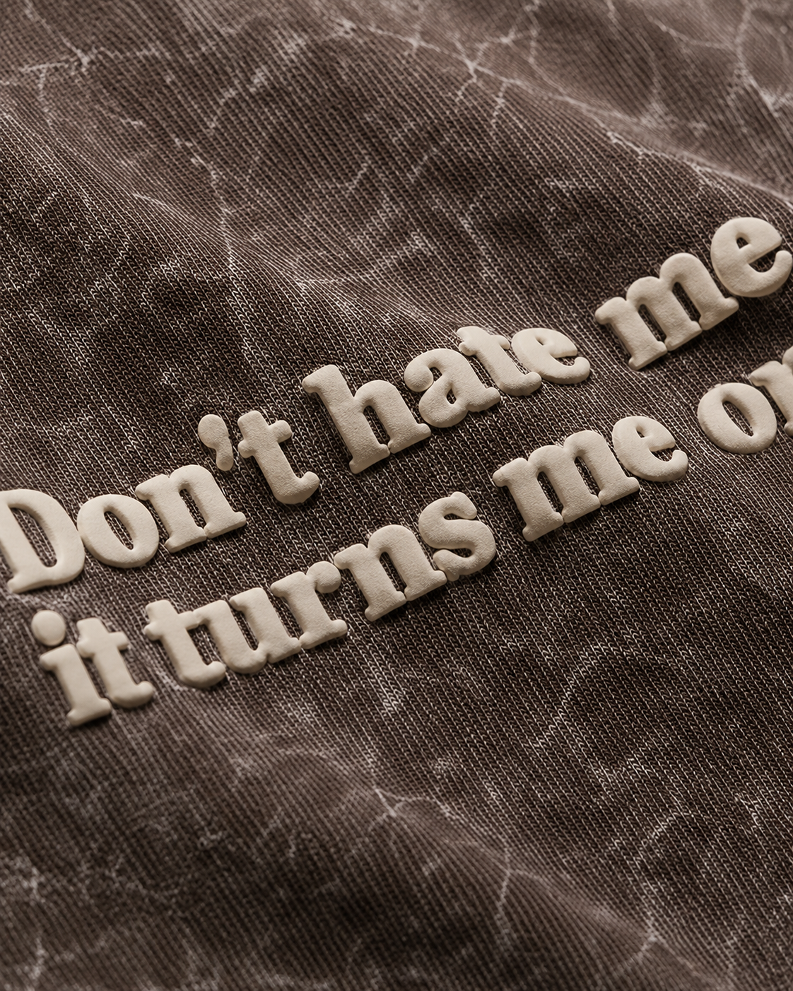 UpClothing Don't Hate Me Mocha acid wash oversized T-shirt — cream raised puff print close-up