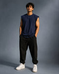 Indian male model wearing UpClothing Off-Duty Oversized Vest in Navy front view